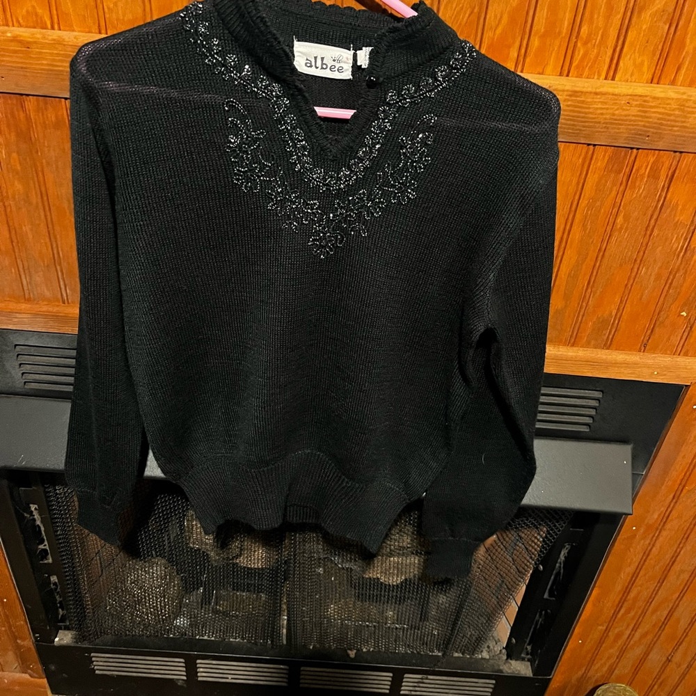 Lovely little sweater with an embellished neckline. Beautiful perfect condition
